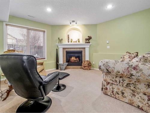 248 Squamish Court West, Lethbridge, AB - Indoor With Fireplace