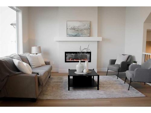 2710 43Rd Street West, Lethbridge, AB - Indoor Photo Showing Living Room With Fireplace