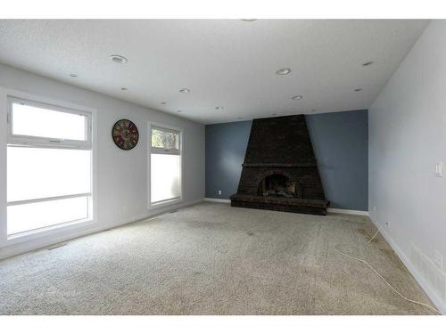 1409 Birch Place South, Lethbridge, AB - Indoor With Fireplace