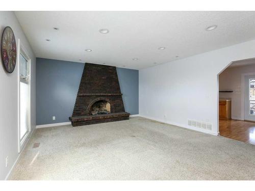 1409 Birch Place South, Lethbridge, AB - Indoor Photo Showing Other Room With Fireplace