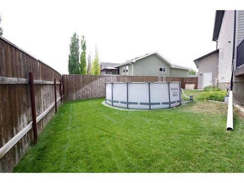 415 Haru Moriyama Place North, Lethbridge, AB - Outdoor With Above Ground Pool With Exterior