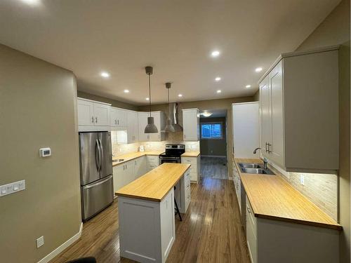 1213 5 Avenue South, Lethbridge, AB - Indoor Photo Showing Kitchen With Stainless Steel Kitchen With Double Sink