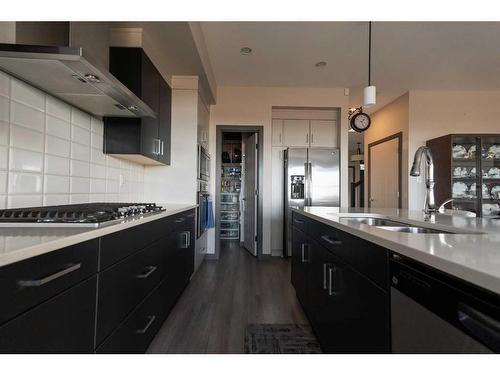 52 Alma Isobell Hodder Crescent Crescent, Lethbridge, AB - Indoor Photo Showing Kitchen With Double Sink With Upgraded Kitchen