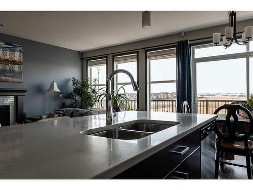 52 Alma Isobell Hodder Crescent Crescent, Lethbridge, AB - Indoor Photo Showing Kitchen With Double Sink