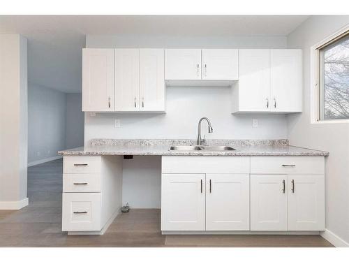 2018 23 Street North, Lethbridge, AB - Indoor Photo Showing Kitchen With Double Sink