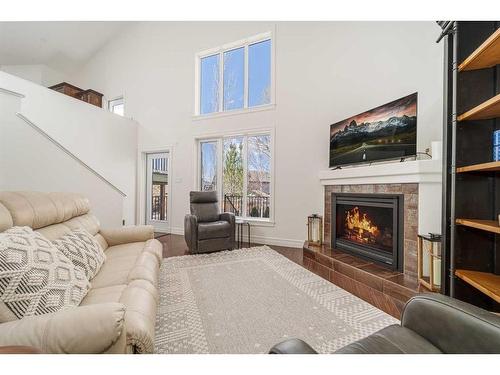 559 Canyon Cove West, Lethbridge, AB - Indoor Photo Showing Living Room With Fireplace