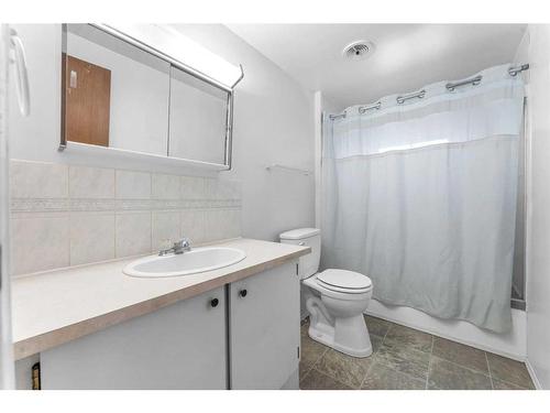 4913 51 Avenue, Stavely, AB - Indoor Photo Showing Bathroom