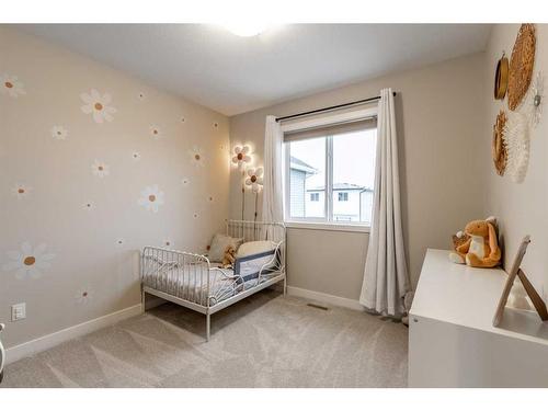 645 Aquitania Boulevard West, Lethbridge, AB - Indoor Photo Showing Bedroom