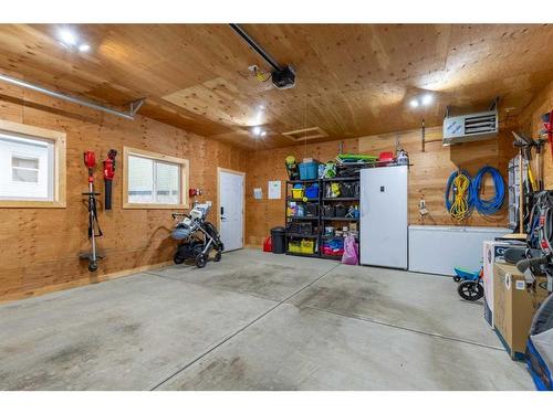 645 Aquitania Boulevard West, Lethbridge, AB - Indoor Photo Showing Garage