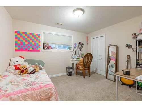 311 Barons Street, Nobleford, AB - Indoor Photo Showing Bedroom