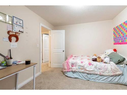 311 Barons Street, Nobleford, AB - Indoor Photo Showing Bedroom