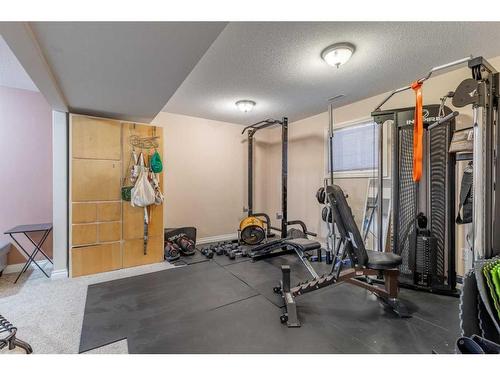 311 Barons Street, Nobleford, AB - Indoor Photo Showing Gym Room