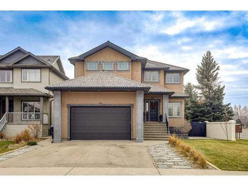 4 Heritage Point West, Lethbridge, AB - Outdoor With Deck Patio Veranda With Facade