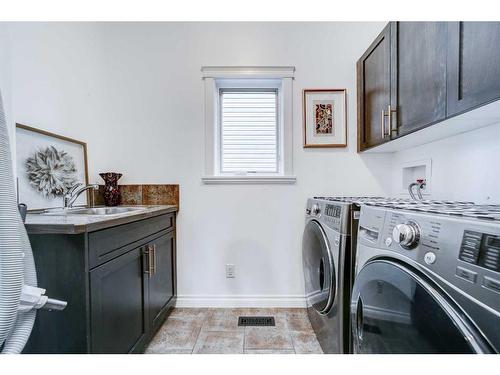 4 Heritage Point West, Lethbridge, AB - Indoor Photo Showing Laundry Room