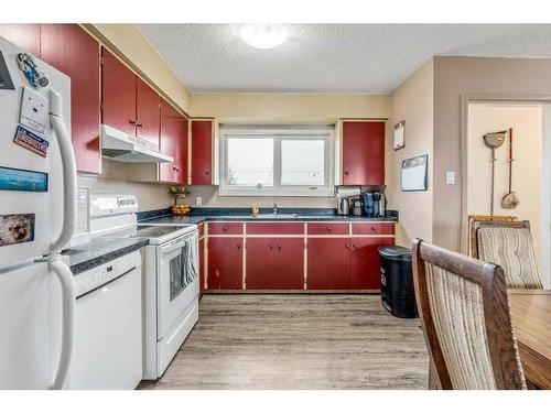 501 51 Avenue, Coalhurst, AB - Indoor Photo Showing Kitchen With Double Sink