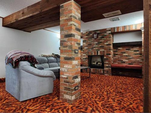 1308 Huron Place South, Lethbridge, AB - Indoor With Fireplace