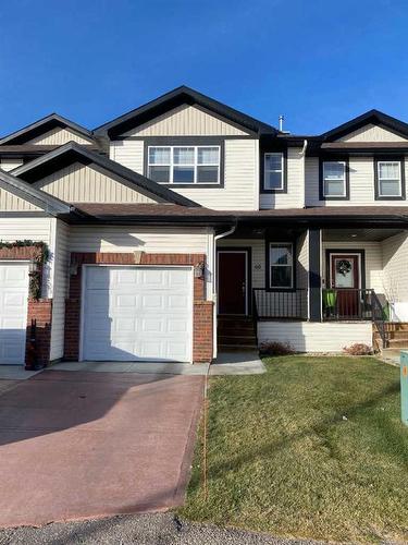 60-295 Blackfoot Road West, Lethbridge, AB - Outdoor With Deck Patio Veranda With Facade