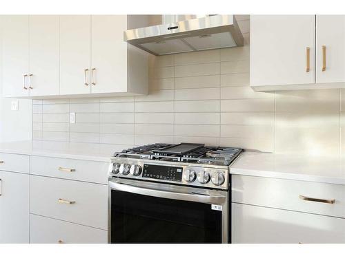 1400 Halifax Road West, Lethbridge, AB - Indoor Photo Showing Kitchen With Upgraded Kitchen