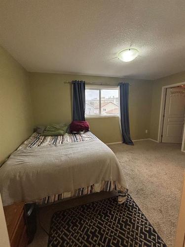 724 Florence Ho Leong Crescent North, Lethbridge, AB - Indoor Photo Showing Bedroom