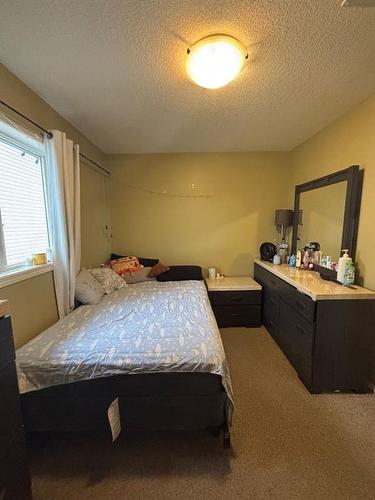 724 Florence Ho Leong Crescent North, Lethbridge, AB - Indoor Photo Showing Bedroom