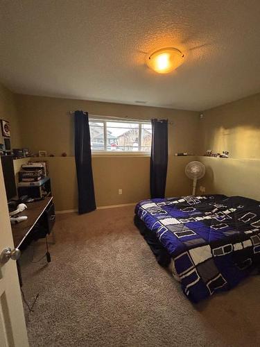 724 Florence Ho Leong Crescent North, Lethbridge, AB - Indoor Photo Showing Bedroom