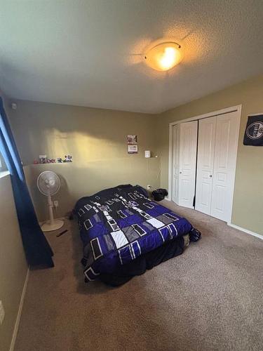 724 Florence Ho Leong Crescent North, Lethbridge, AB - Indoor Photo Showing Bedroom