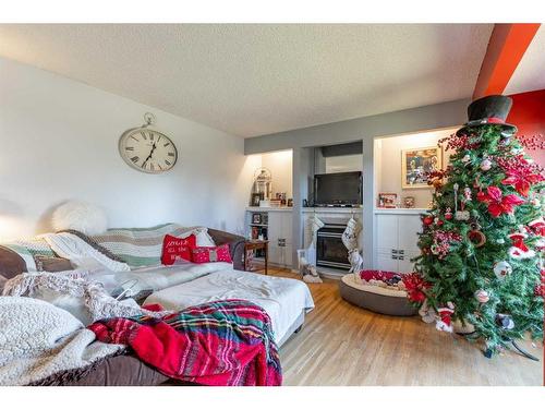 1124 29A Street South, Lethbridge, AB - Indoor Photo Showing Living Room With Fireplace