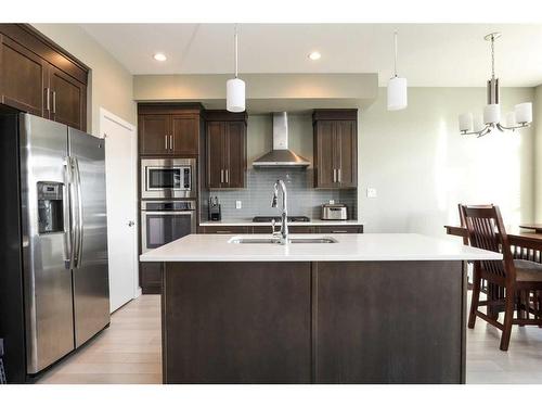 325 Rivergrove Chase West, Lethbridge, AB - Indoor Photo Showing Kitchen With Upgraded Kitchen