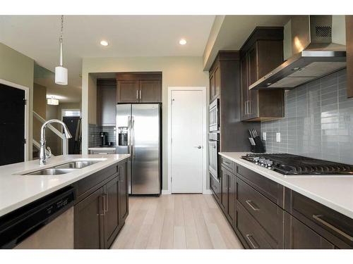 325 Rivergrove Chase West, Lethbridge, AB - Indoor Photo Showing Kitchen With Double Sink With Upgraded Kitchen