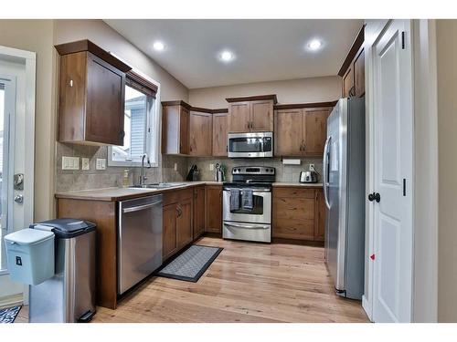 574 Mary Cameron Crescent North, Lethbridge, AB - Indoor Photo Showing Kitchen With Double Sink