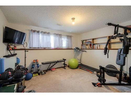 2301 13 Street, Coaldale, AB - Indoor Photo Showing Gym Room