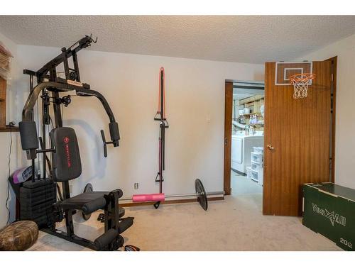 2301 13 Street, Coaldale, AB - Indoor Photo Showing Gym Room