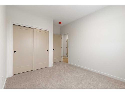 308 Bridge Crossing Close, Raymond, AB - Indoor Photo Showing Other Room