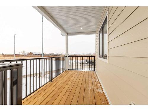 308 Bridge Crossing Close, Raymond, AB - Outdoor With Exterior