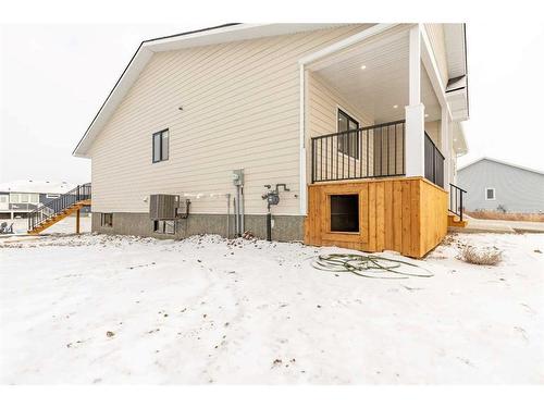 308 Bridge Crossing Close, Raymond, AB - Outdoor With Exterior