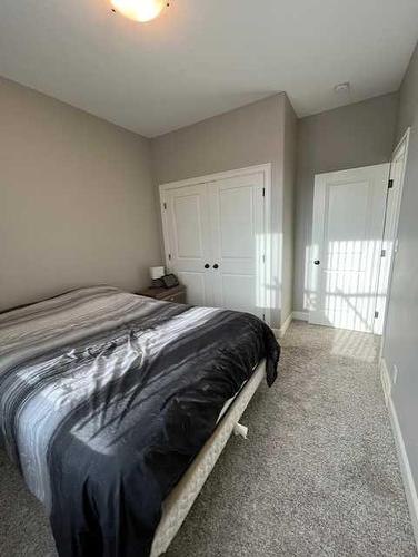 8 Westview Place, Taber, AB - Indoor Photo Showing Bedroom