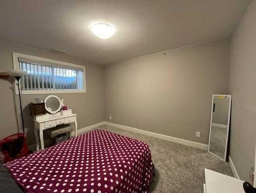 8 Westview Place, Taber, AB - Indoor Photo Showing Bedroom