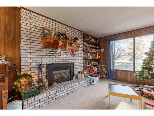 282 W 4 Avenue South, Magrath, AB - Indoor Photo Showing Other Room With Fireplace