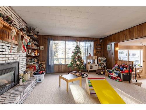 282 W 4 Avenue South, Magrath, AB - Indoor Photo Showing Living Room With Fireplace