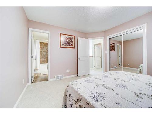 351 Mt Sunburst Way West, Lethbridge, AB - Indoor Photo Showing Bedroom