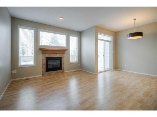 32-295 Blackfoot Road West, Lethbridge, AB - Indoor Photo Showing Living Room With Fireplace