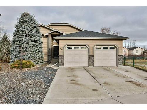 81 Salish Place West, Lethbridge, AB - Outdoor With Facade