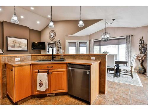 81 Salish Place West, Lethbridge, AB - Indoor Photo Showing Kitchen With Double Sink