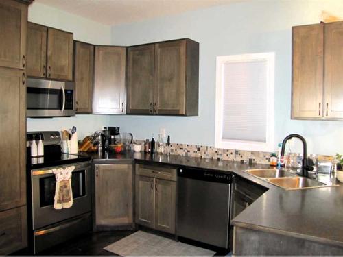 452 Margaret Avenue, Duchess, AB - Indoor Photo Showing Kitchen With Double Sink