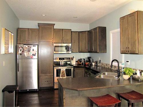 452 Margaret Avenue, Duchess, AB - Indoor Photo Showing Kitchen With Double Sink