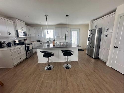 61 Ironstone Drive, Coleman, AB - Indoor Photo Showing Kitchen With Stainless Steel Kitchen With Upgraded Kitchen