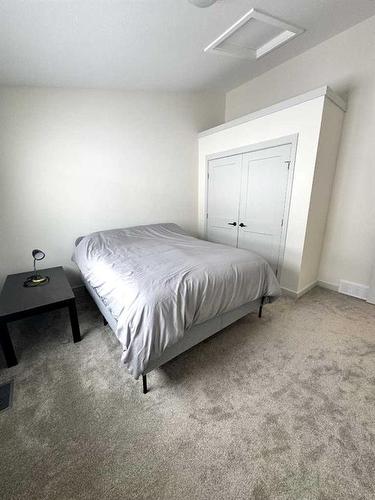 61 Ironstone Drive, Coleman, AB - Indoor Photo Showing Bedroom