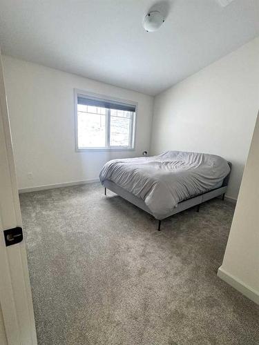 61 Ironstone Drive, Coleman, AB - Indoor Photo Showing Bedroom