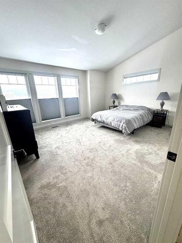 61 Ironstone Drive, Coleman, AB - Indoor Photo Showing Bedroom