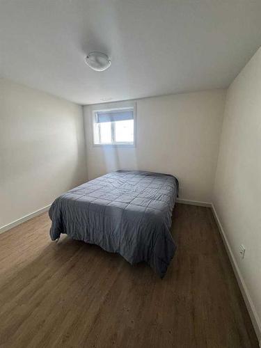 61 Ironstone Drive, Coleman, AB - Indoor Photo Showing Bedroom